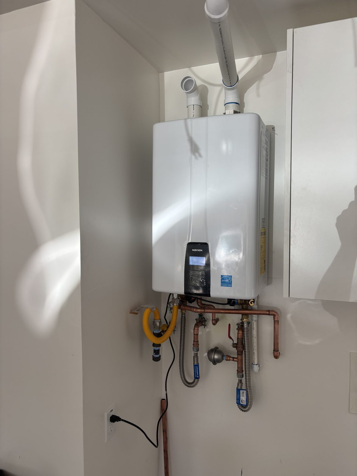 Tankless water heater installation with copper piping